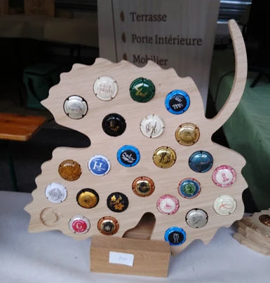 Un support à capsules en forme de feuille de vigne