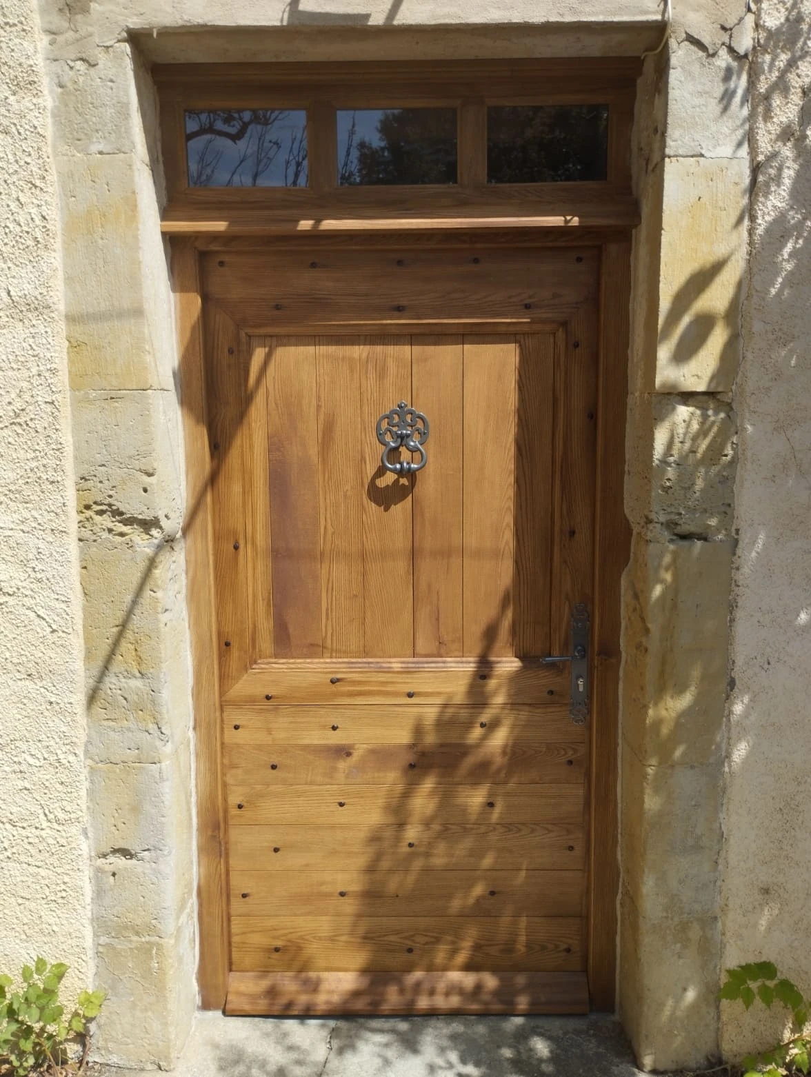Porte d'entrée en bois massif