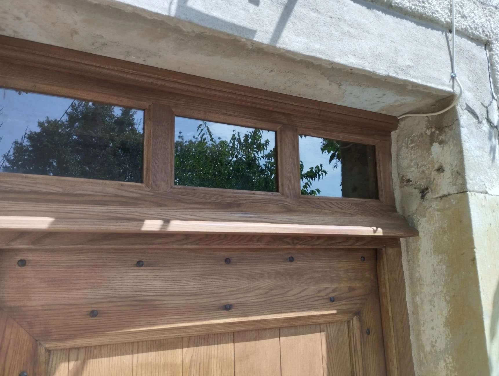 Porte d'entrée en bois massif