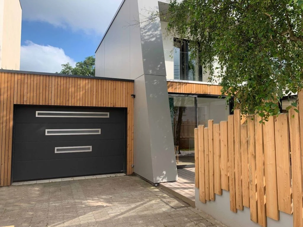 Portes de garage SDA – performance, design et sur-mesure pour votre habitat