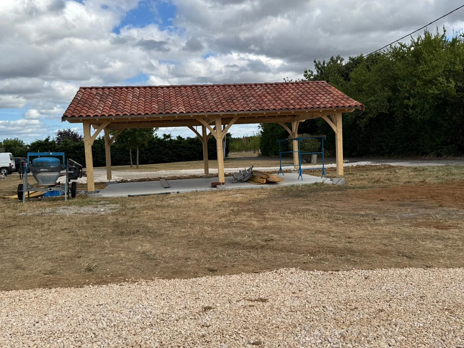 Fabrication de carport sur mesure – Abri voiture bois artisanal