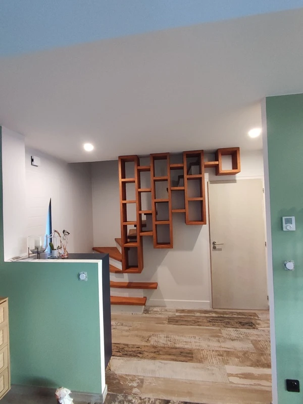 Fabrication d'un escalier avec un garde corps bibliothèque à Beutin