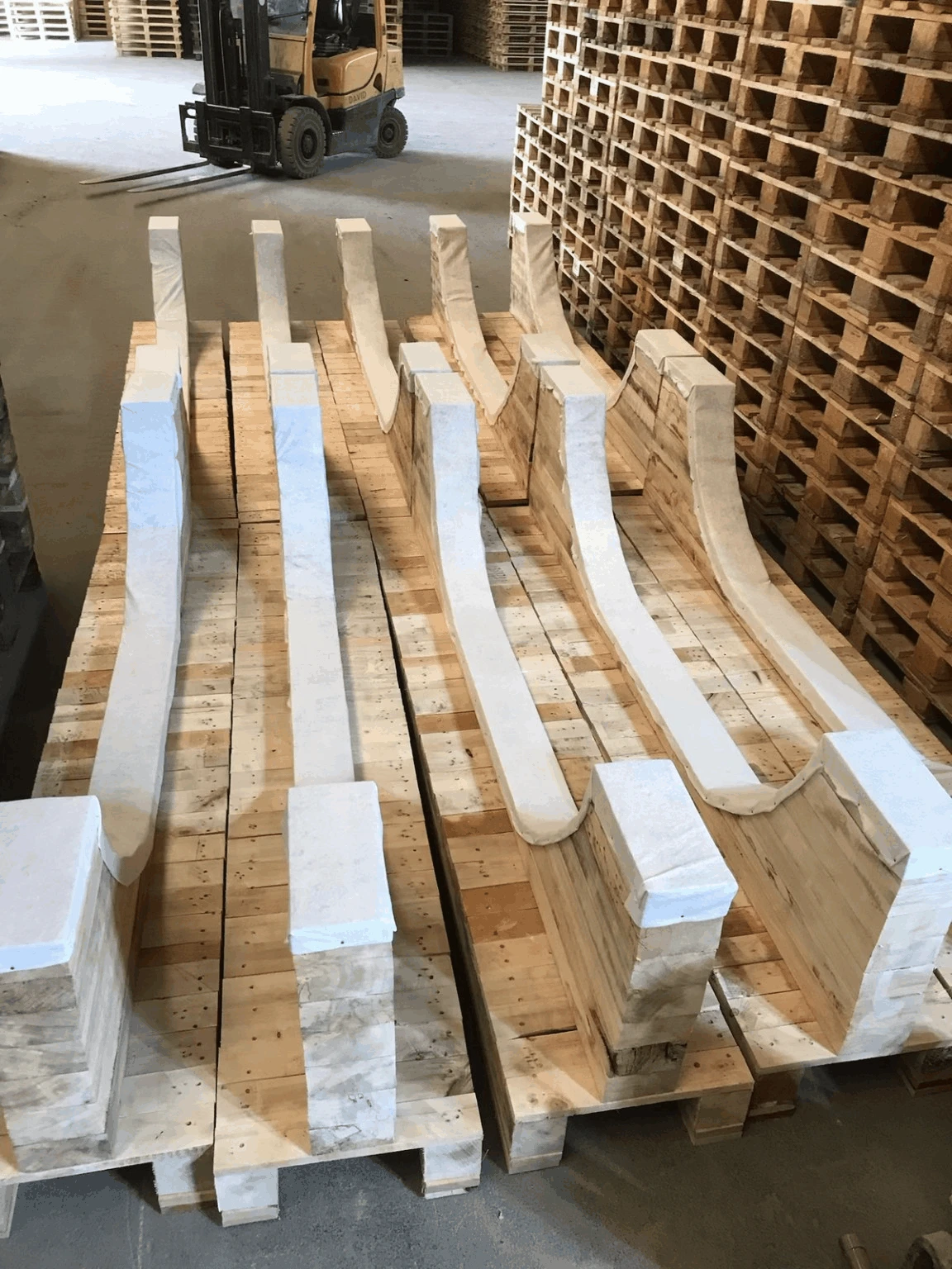 Berceaux en bois sur mesure pour le transport de tuyaux et charges cylindriques
