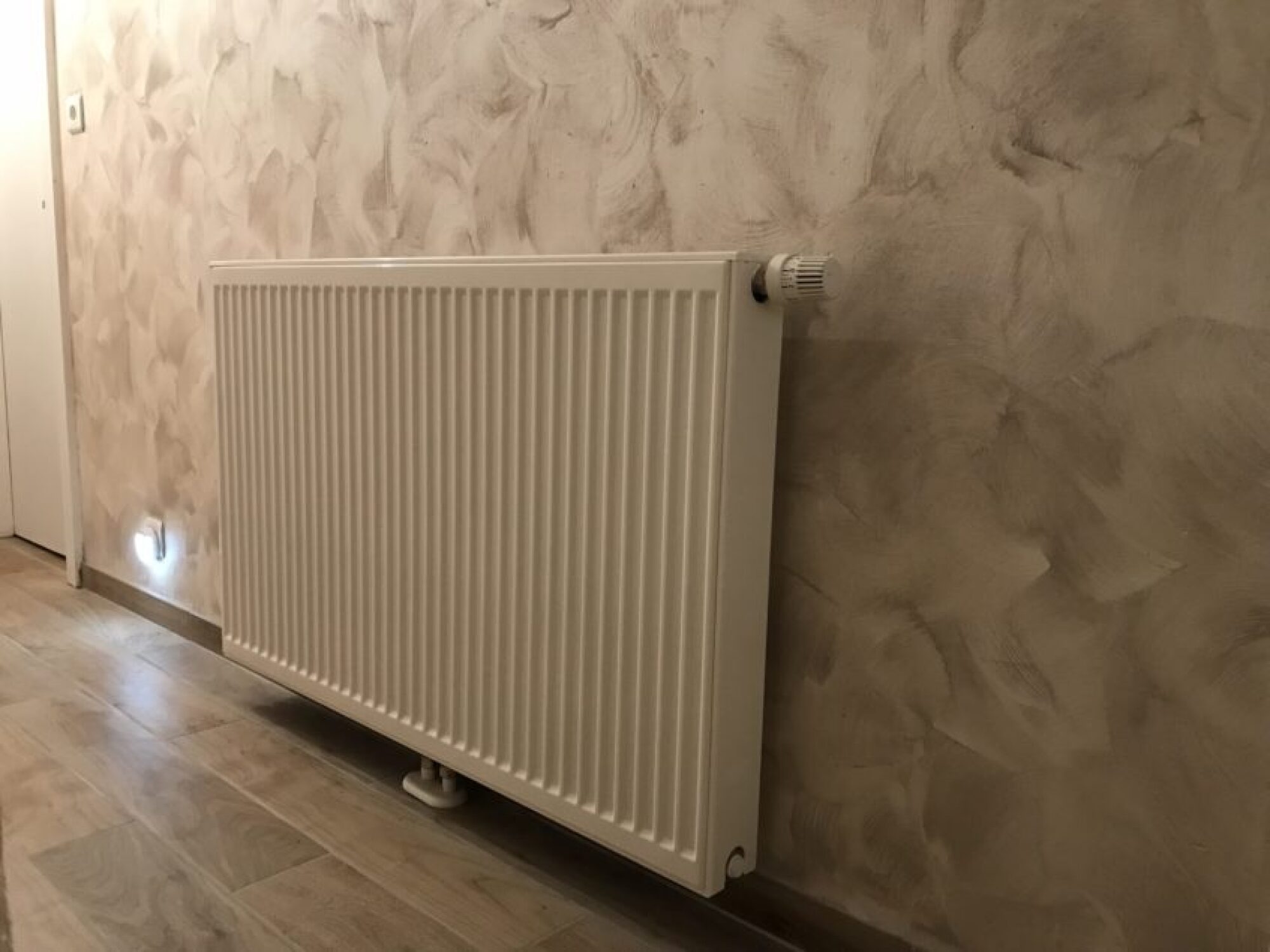 Installation chauffage central complet avec création distribution, pose d'une PAC AIR-EAU PANASONIC dans une maison à Fegersheim