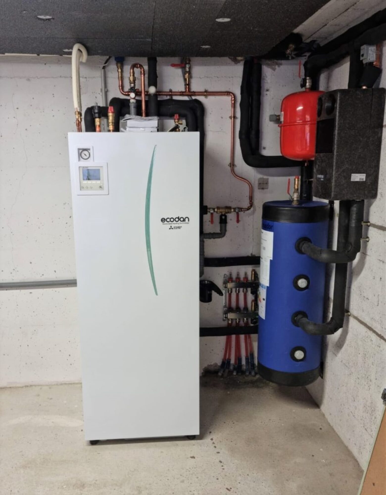 Remplacement chaudière par un PAC AIR-EAU MITSUBISHI, ECS intégrée, groupe extérieur, gamme silence dans une maison à Boofzheim