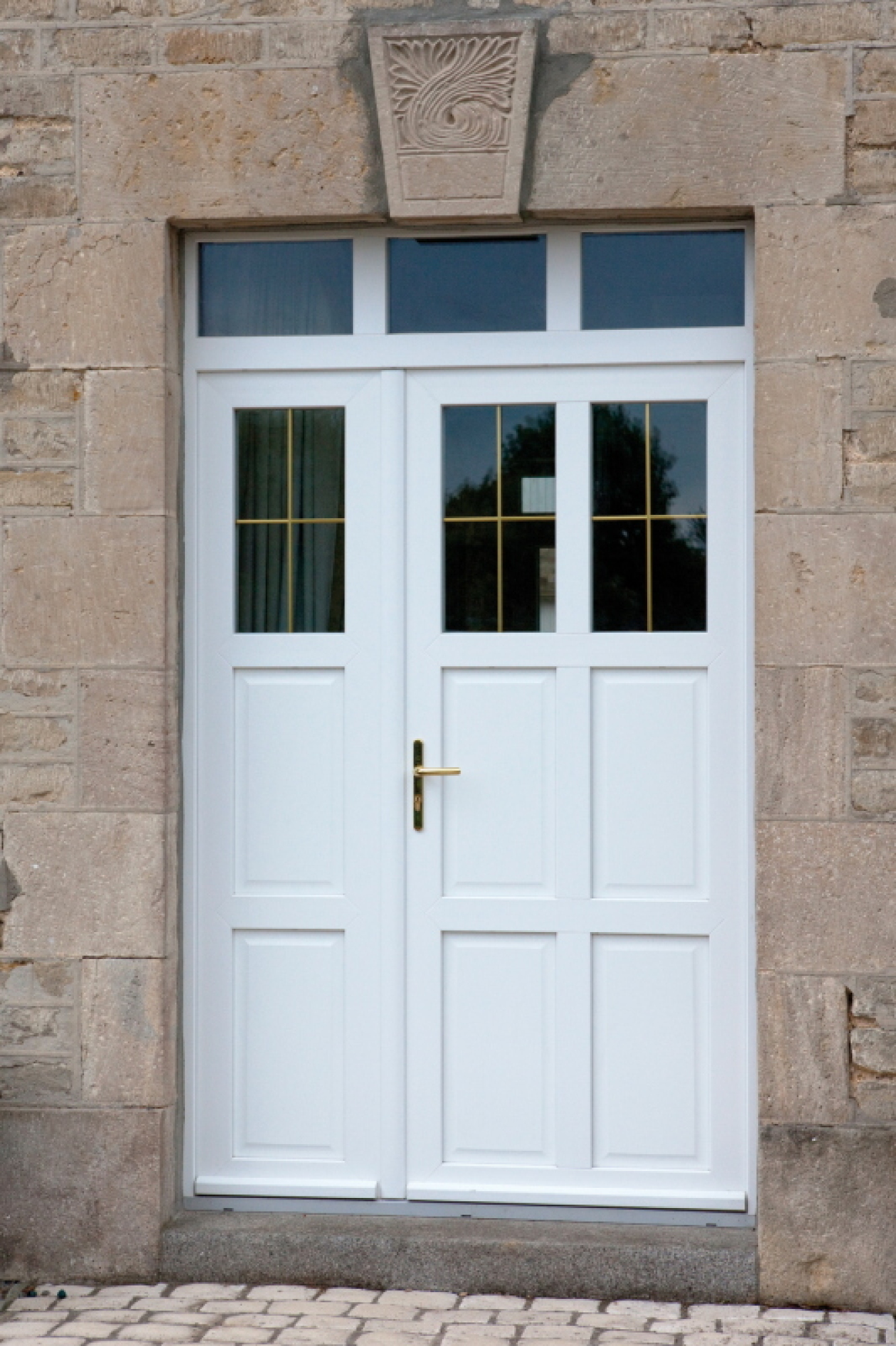 Fourniture et pose de porte PVC