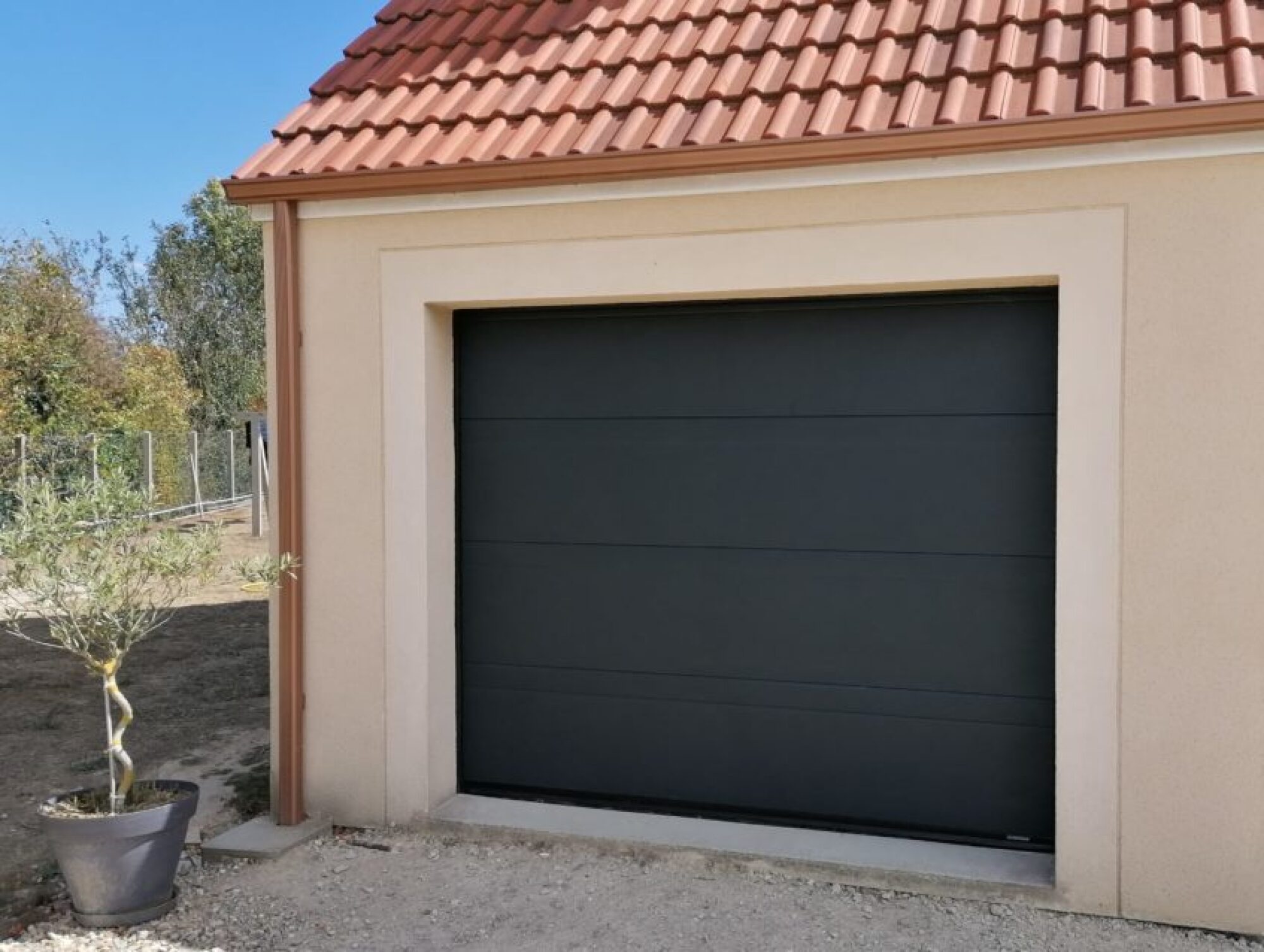 Porte de garage sectionnelle sur-mesure