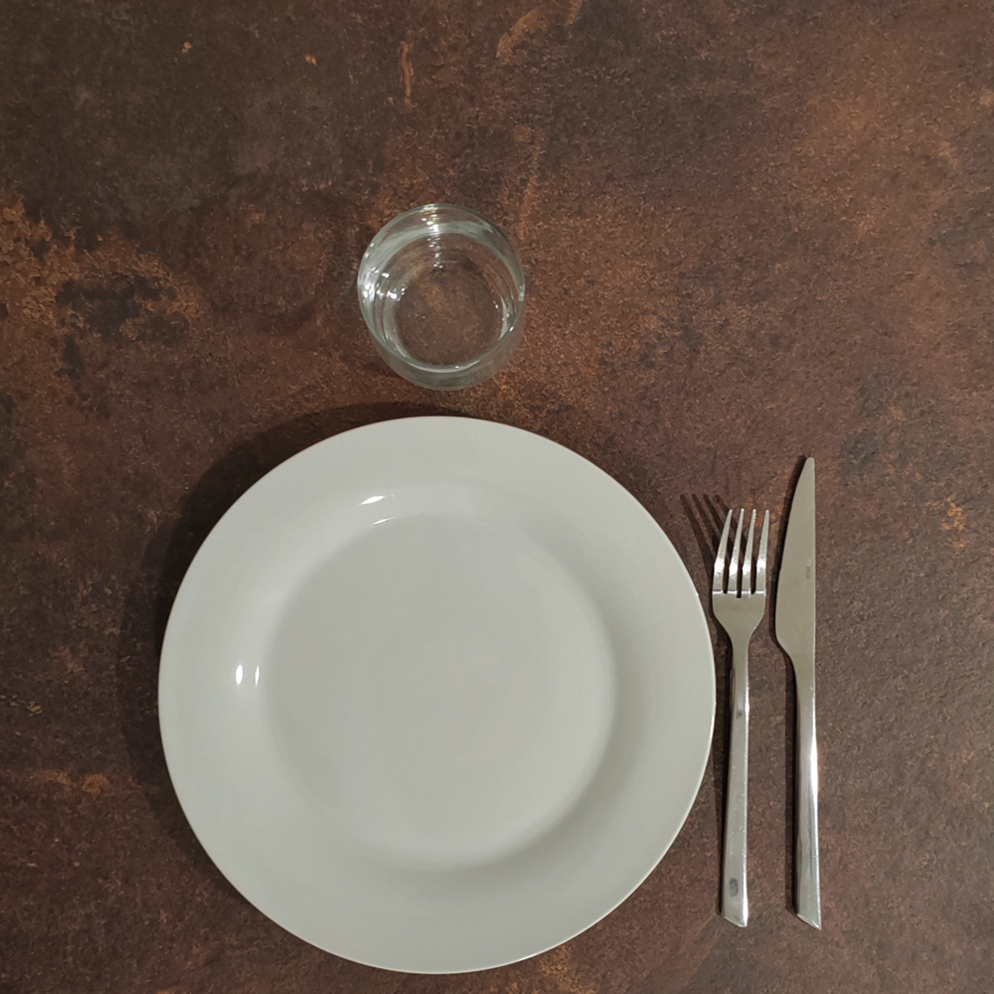 Table ronde Ø80cm - modèle Bazila rouille roc