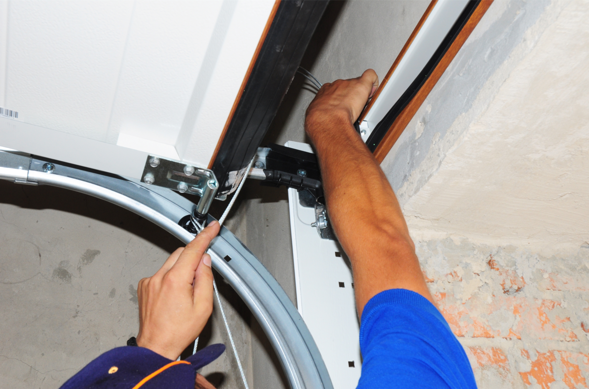 Réparation de portes de garage enroulables